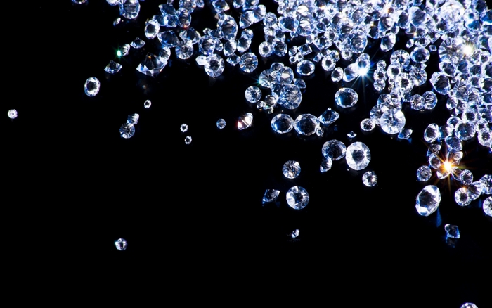 Scattered Diamonds on Black Background