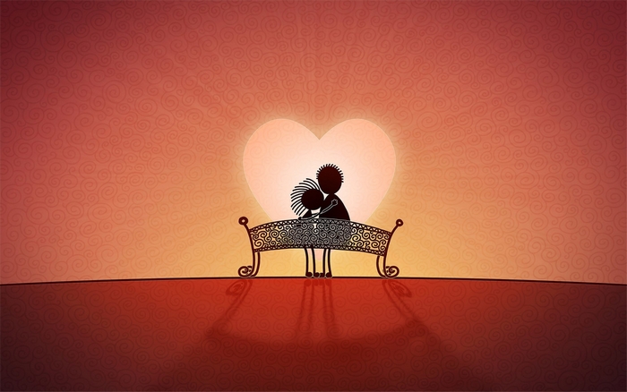 Couple on a bench in front of a heart