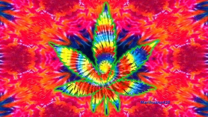 Tie-dye marijuana leaf on colorful background