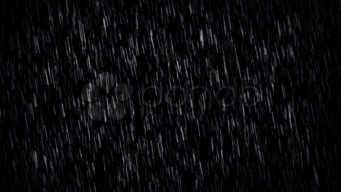 Rain falling on a black background