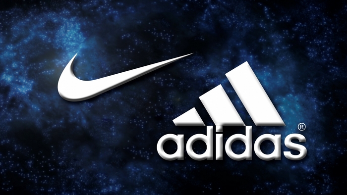 Nike and Adidas logos on a starry background
