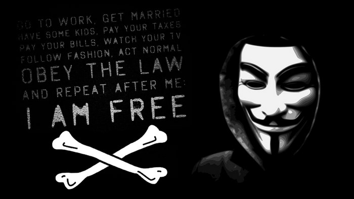Anonymous mask and text about freedom