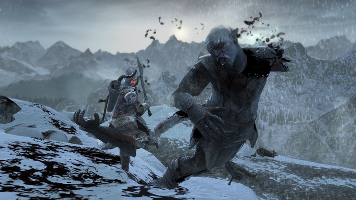 Orc and warrior fighting in snowy mountains