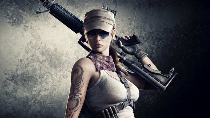 Woman in cap holding a rifle