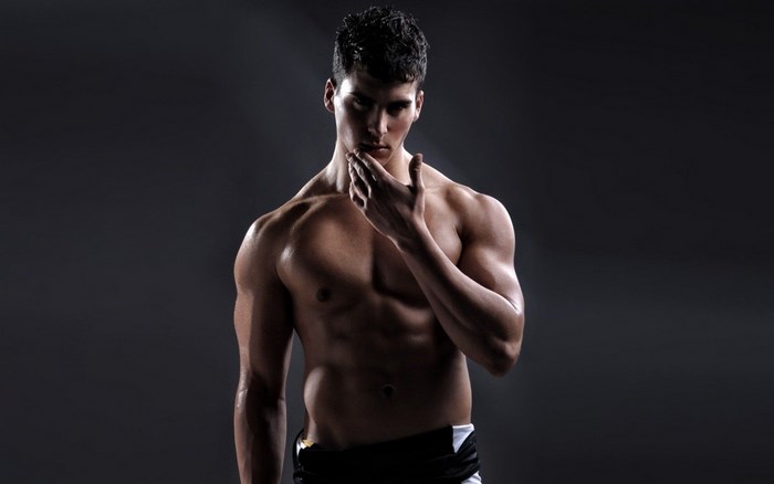 Muscular man posing in studio