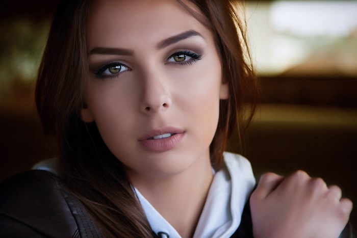 Close-Up Portrait of a Young Woman with Intense Gaze