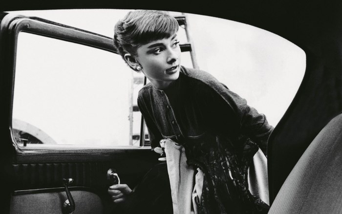 Audrey Hepburn in a car