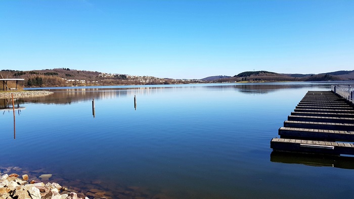 Lake with Dock and Hills