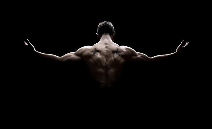 Muscular Man with Star Tattoos in 4K