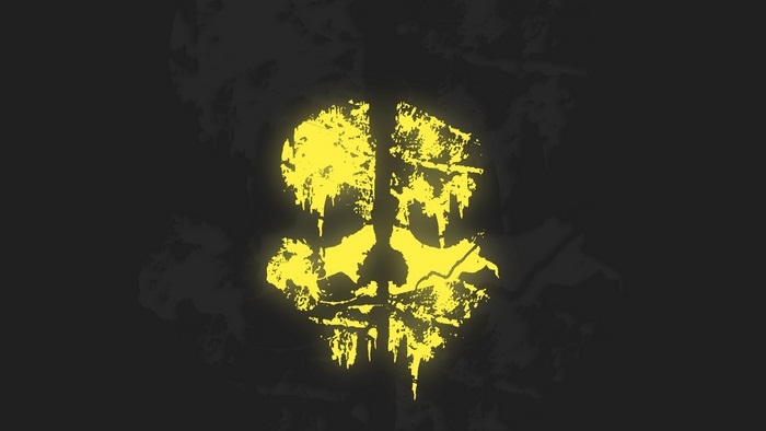 4K Yellow Mask Symbol on Dark Background