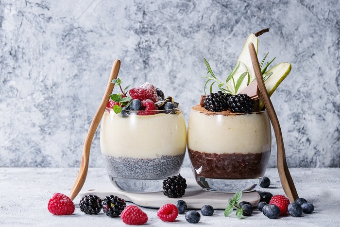 Dessert with berries and pear slices