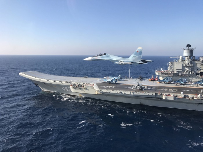 Russian aircraft carrier Admiral Kuznetsov with fighter jet