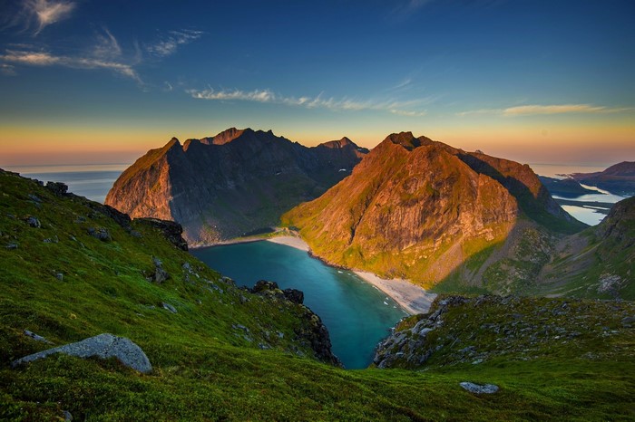 Mountain beach at sunset in Norway