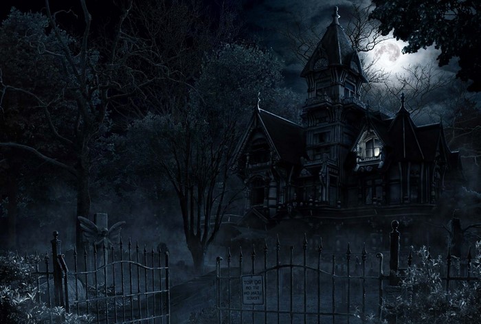 Spooky gothic haunted house at night with full moon