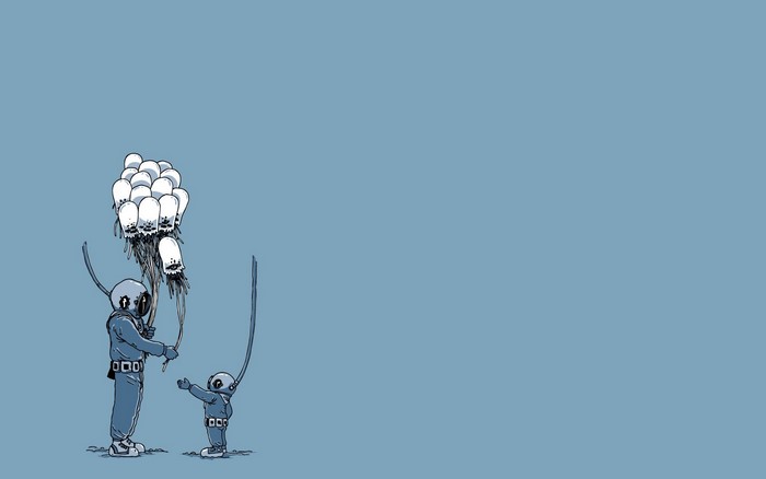 Two divers with jellyfish balloons