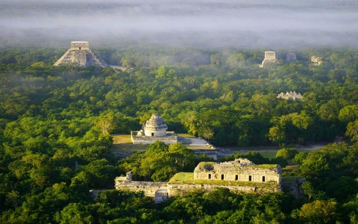Chichen Itza ruins in Mexico with morning mist