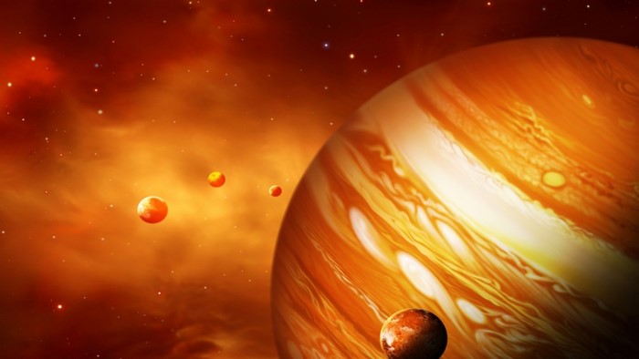 Jupiter and moons in a nebula