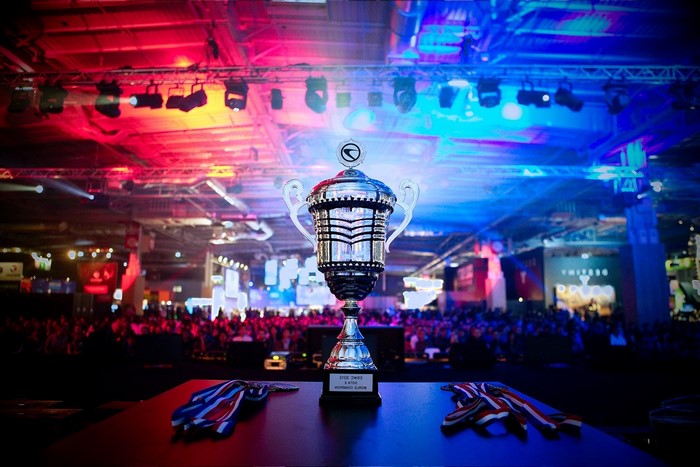 Esports trophy with medals on a table