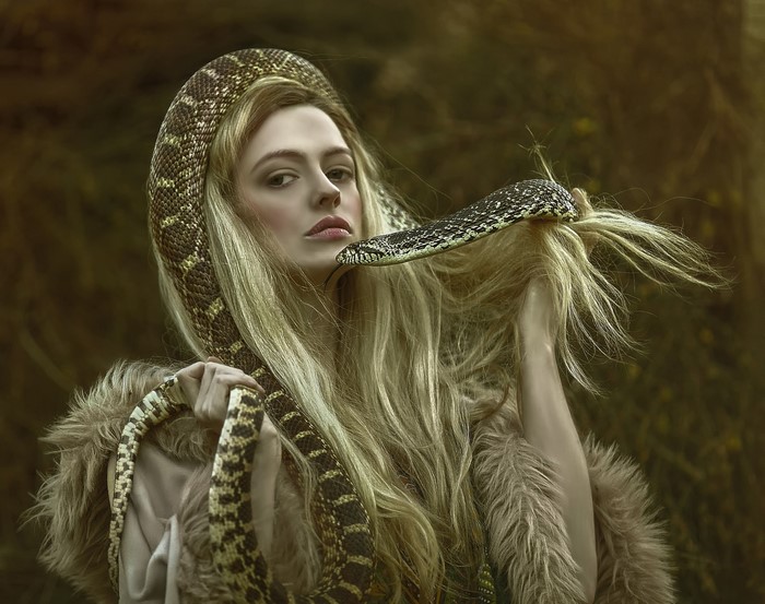 Woman with snake in fantasy art