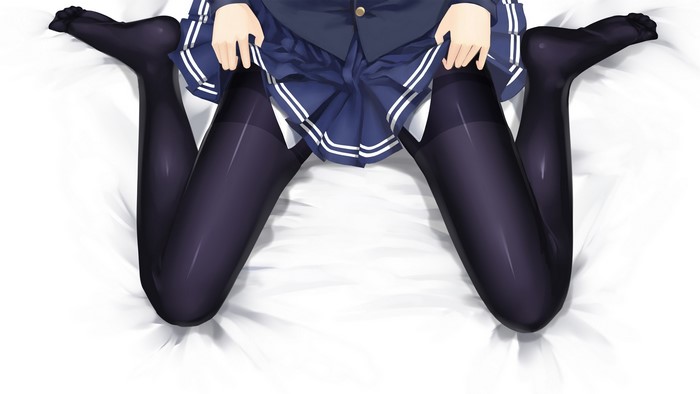 Girl in school uniform and pantyhose on bed