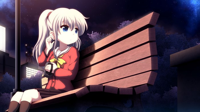 Nao Tomori from Charlotte listening to music in a park at night