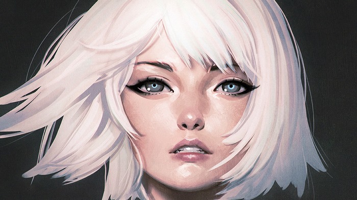 Close-up of a woman with white hair and blue eyes