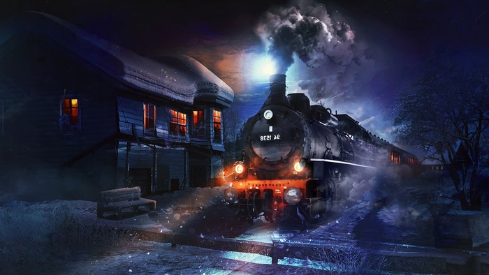 Steam locomotive passing a house in winter at night