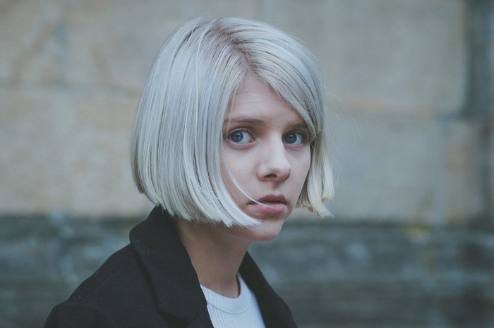 Aurora Aksnes with short blonde hair