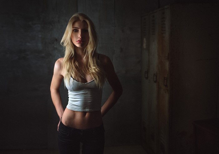 Woman in tank top and jeans