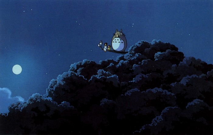 Totoro and children sitting on a tree at night