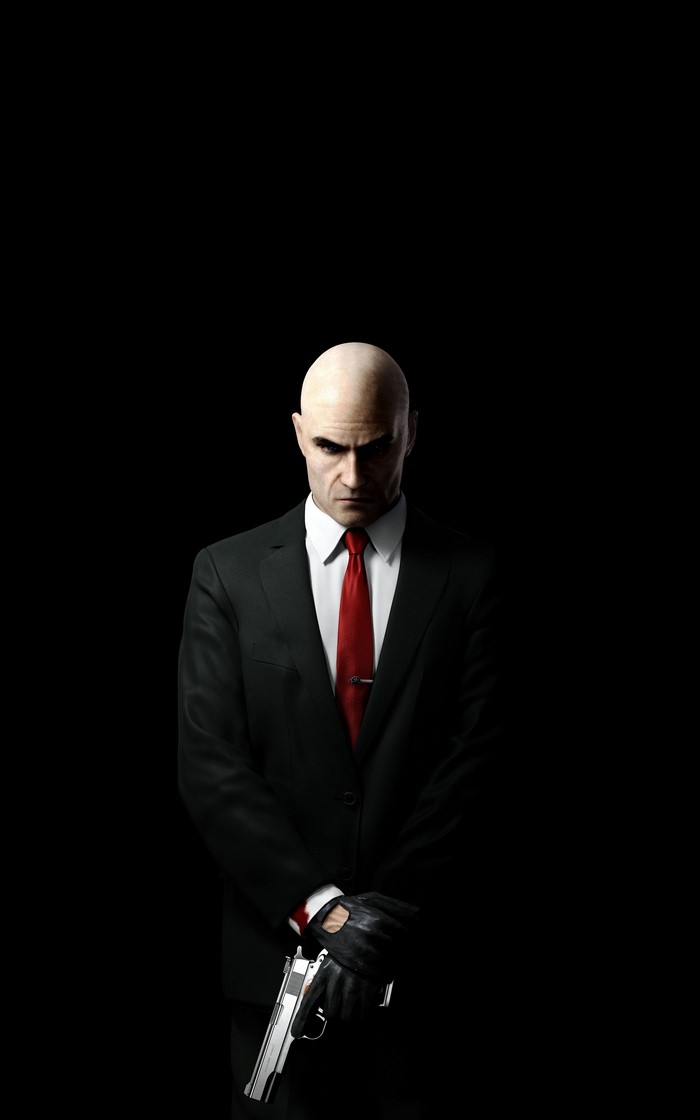Agent 47 from Hitman holding a gun