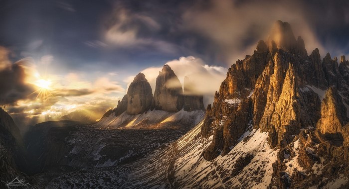 Winter Sunrise Over Snowy Mountain Peaks