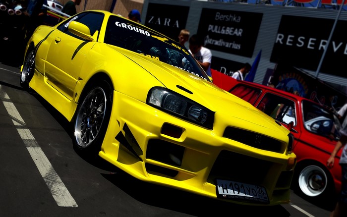 Yellow Nissan Skyline GT-R R34 JDM Tuning Car