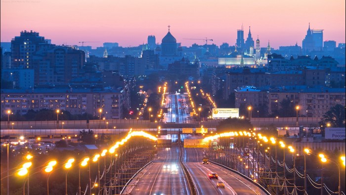 Moscow Cityscape at Sunset with Road and Lights