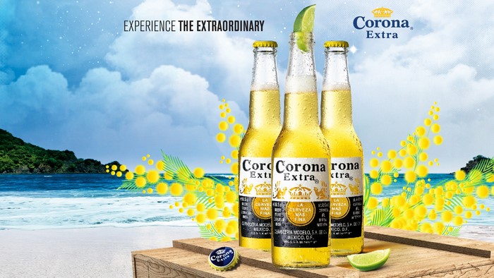 Corona Extra beer bottles on a beach