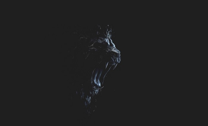 Dark abstract lion head with fangs
