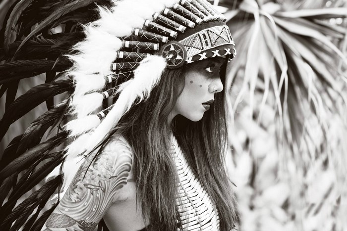 Profile of Woman Wearing Native American Headdress