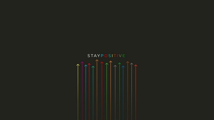 Stay Positive text with colorful arrows