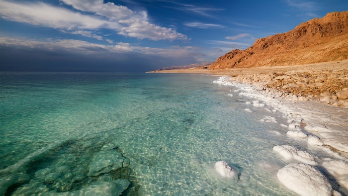 Dead Sea Shore with Salt Formations and Mountains