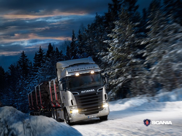Scania R 730 Highline truck with logs in winter