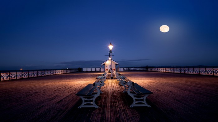 Moonlit Night on a Wooden Pier