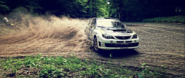 Subaru Impreza WRX STI rally car on dirt track