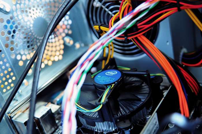Computer internal view with Intel CPU fan and wires