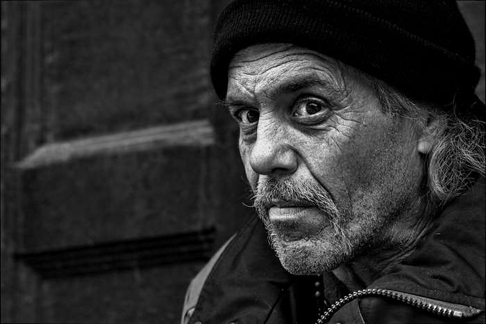 Black and white close-up of an older man