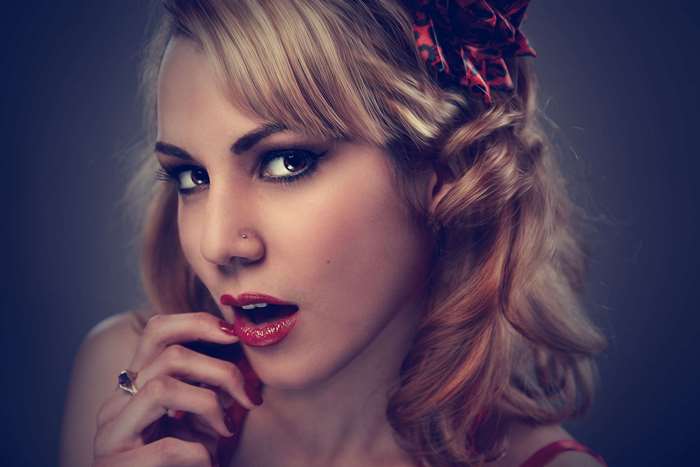 Woman with blonde hair and red lipstick