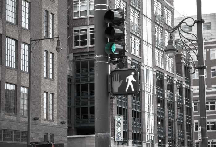 Traffic light and pedestrian crossing in a city
