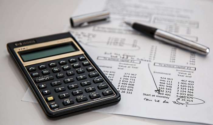 Calculator and Financial Documents for Budgeting