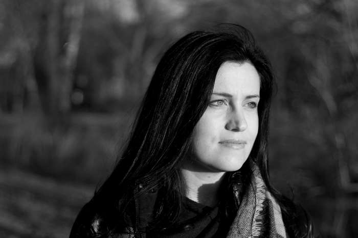 Black and white portrait of a woman with dark hair