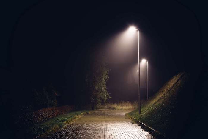 Street lights in mist at night