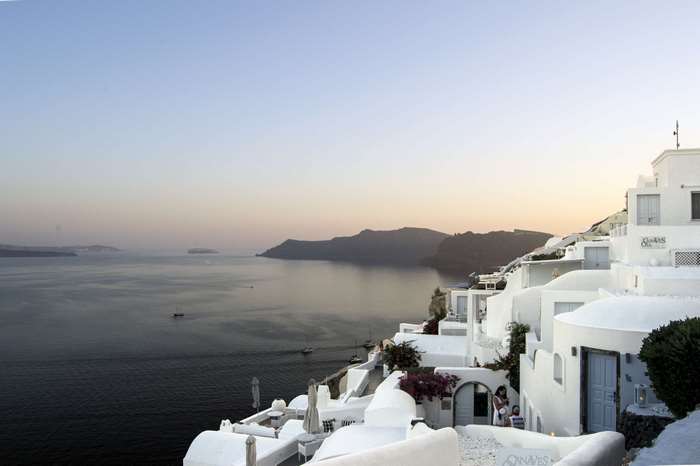White houses on Santorini island at sunset